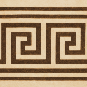 Traditional Greek meander pattern on ancient ceramic or architectural frieze.